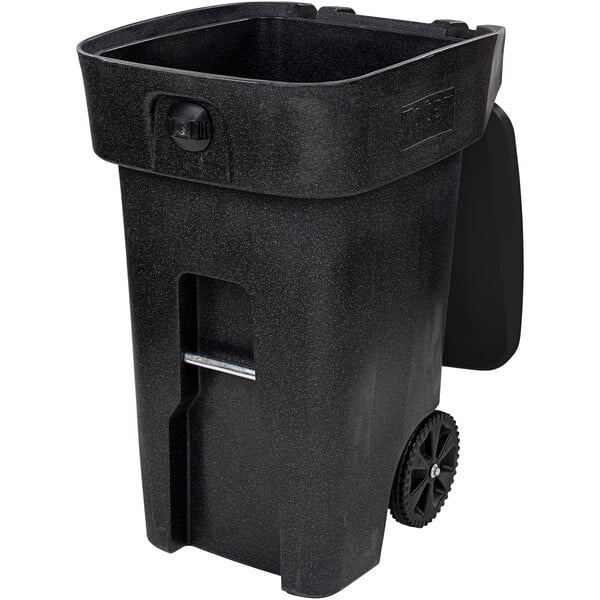 A black Toter rectangular wheeled trash can with locking lid.