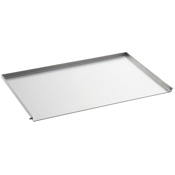 A rectangular stainless steel tray with a white border.