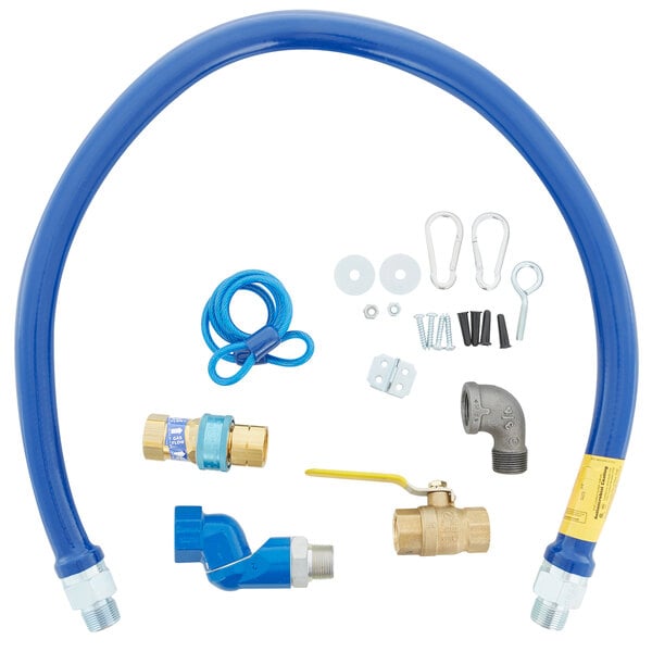 A blue Dormont gas connector kit with various parts and a restraining cable.