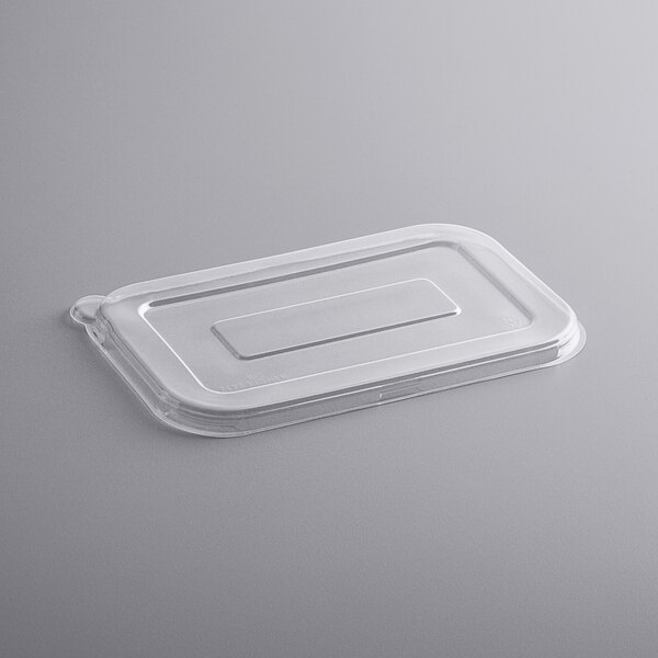 A Fineline clear PETE flat lid on a clear plastic container.