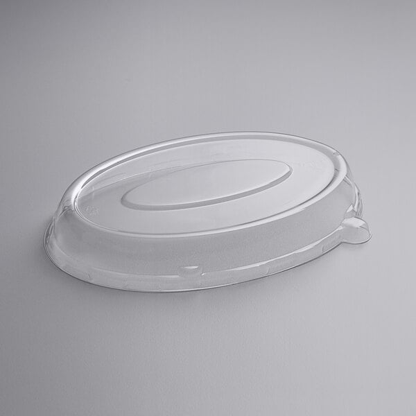 A clear Fineline plastic dome lid with vent for an oval container.
