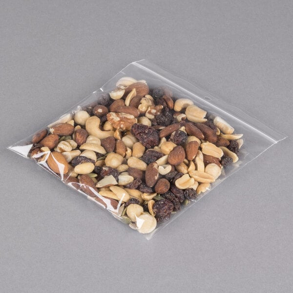 A LK Packaging resealable plastic food bag with a mix of nuts and raisins.