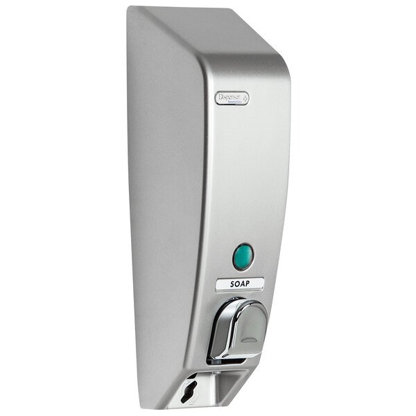 A satin silver wall mounted locking bulk amenity dispenser with a green button.
