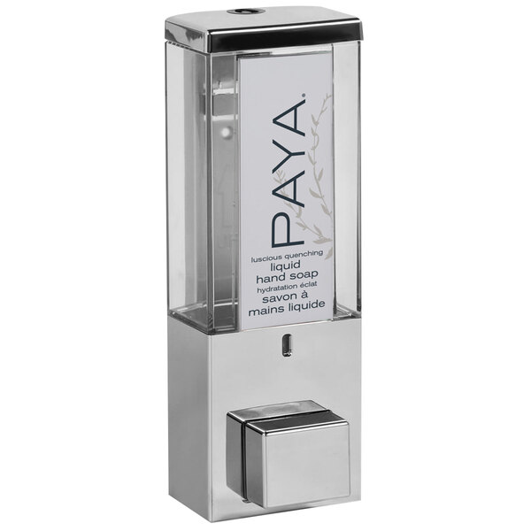 A chrome wall mounted shower dispenser with a clear plastic container and Paya logo.