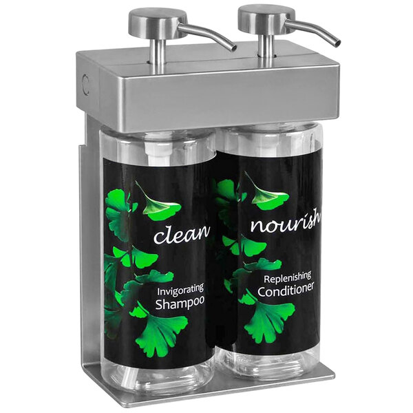 A Dispenser Amenities wall-mounted shower dispenser with two oval bottles with a black and white label with green leaves.