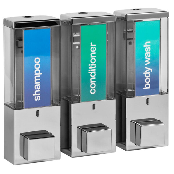 A chrome wall-mounted shower dispenser with three translucent bottles.