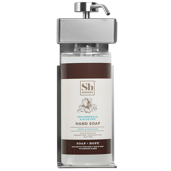 The oval bottle of hand soap in a Dispenser Amenities wall-mounted shower dispenser.