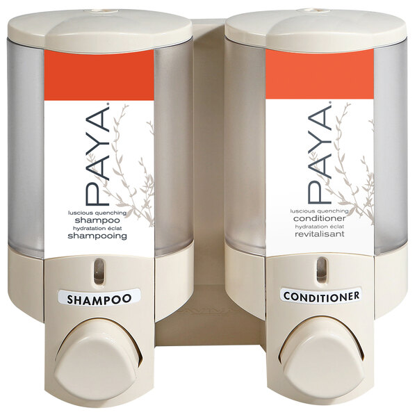 A white Aviva wall-mounted dispenser with two translucent plastic bottles with Paya labels.
