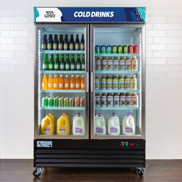An Avantco black swing glass door merchandiser refrigerator with drinks and beverages inside.