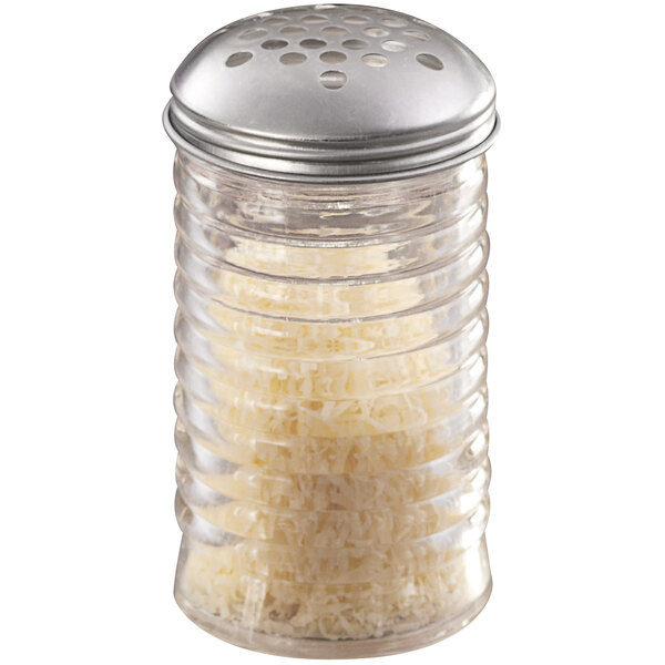 An American Metalcraft glass beehive cheese shaker with a stainless steel lid.