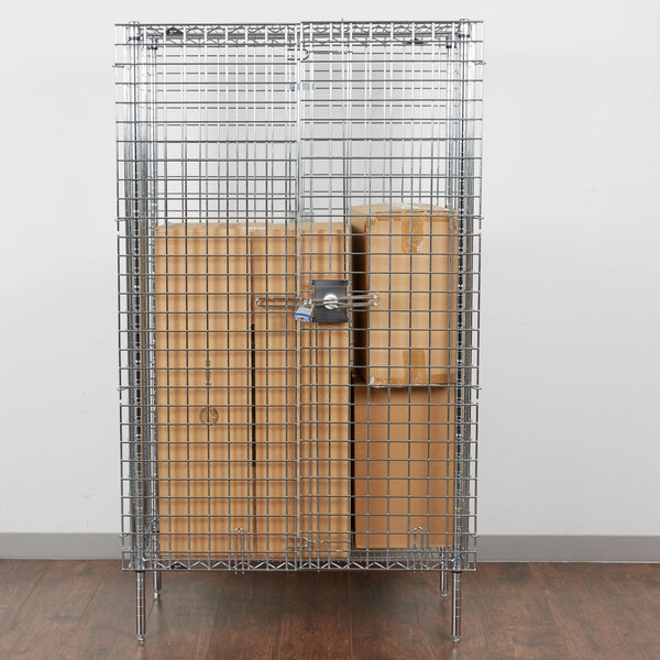 A Metro chrome wire security cabinet with a padlock on it.