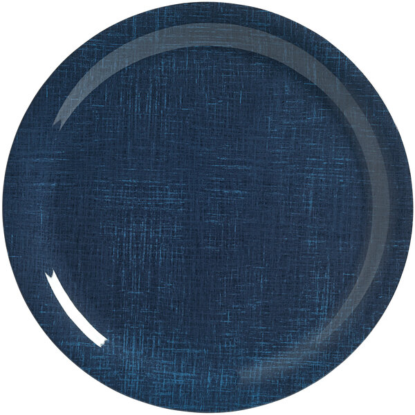 An American Metalcraft Jane Casual denim melamine plate with a white line on a textured blue surface.