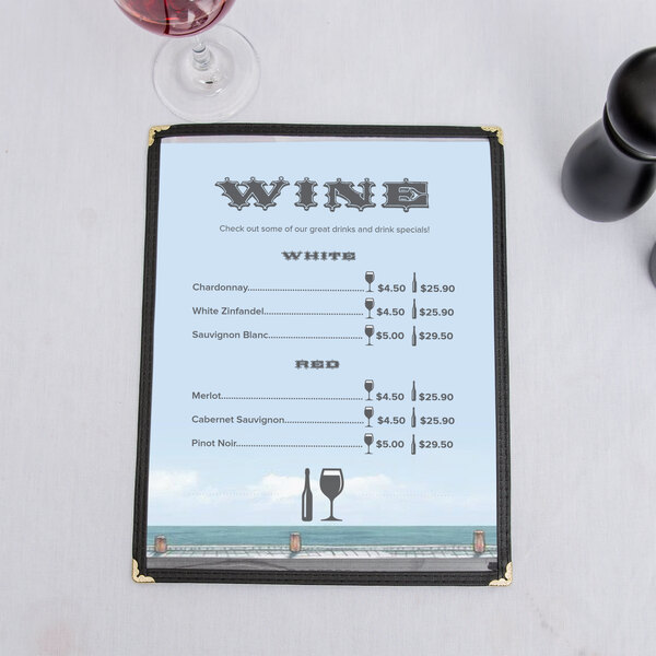 A Seafood Harbor themed menu on a table with a glass of wine.