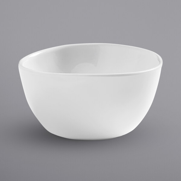 An American Metalcraft white melamine bouillon cup with a curved edge.