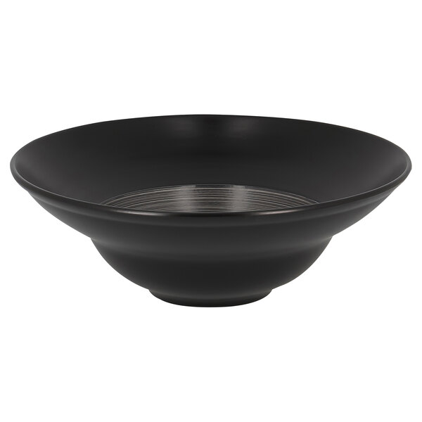 A black porcelain plate with a grey and black rim.