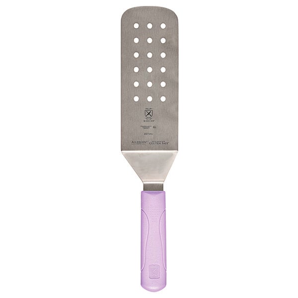A close-up of a Mercer Culinary purple perforated turner.