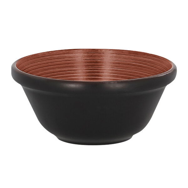 A brown and black stackable porcelain bowl with a brown rim.