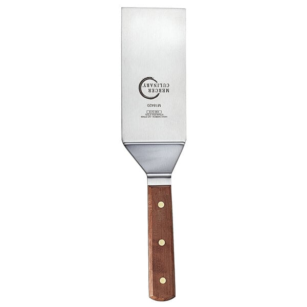 A close-up of a Mercer Culinary Praxis square edge turner with a rosewood handle.