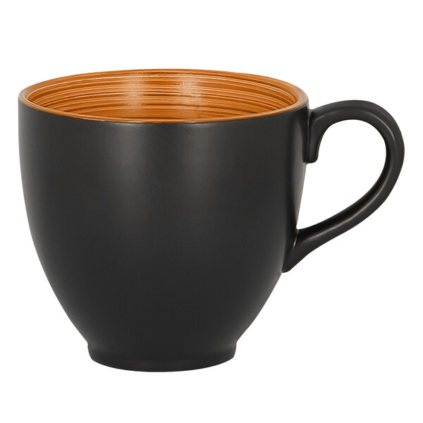 A black and orange RAK Porcelain cup with a handle.