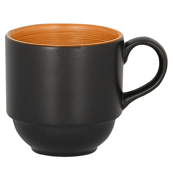 A stackable RAK Porcelain cedar and black cup with a handle.