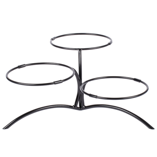 A black metal Vollrath display stand with three rings.