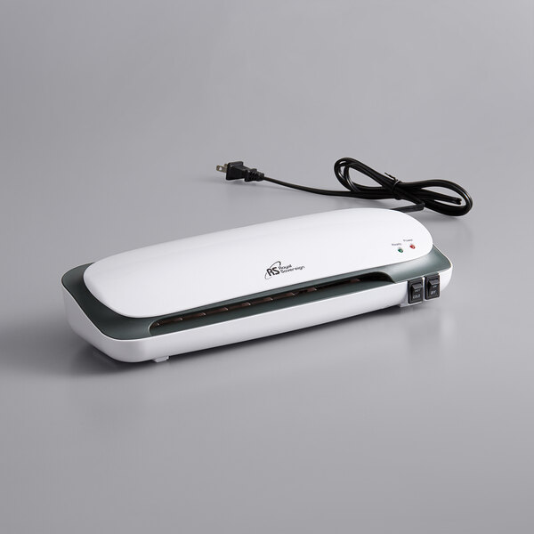 A white Royal Sovereign thermal laminator with a black label and cord.