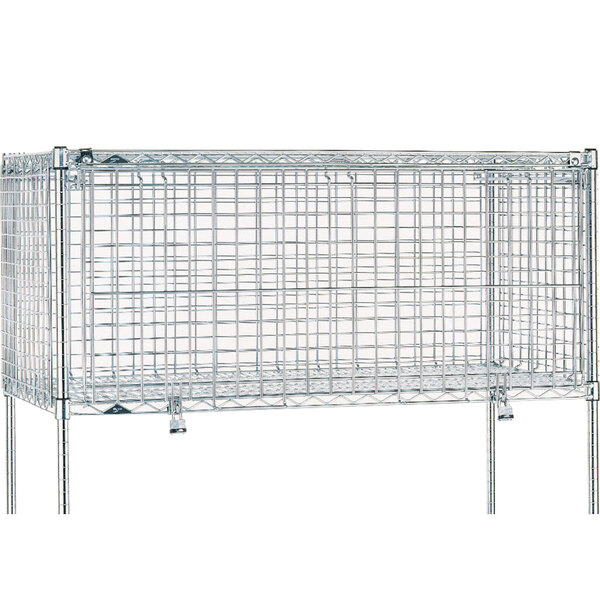 A close-up of a wire cage with a metal structure.