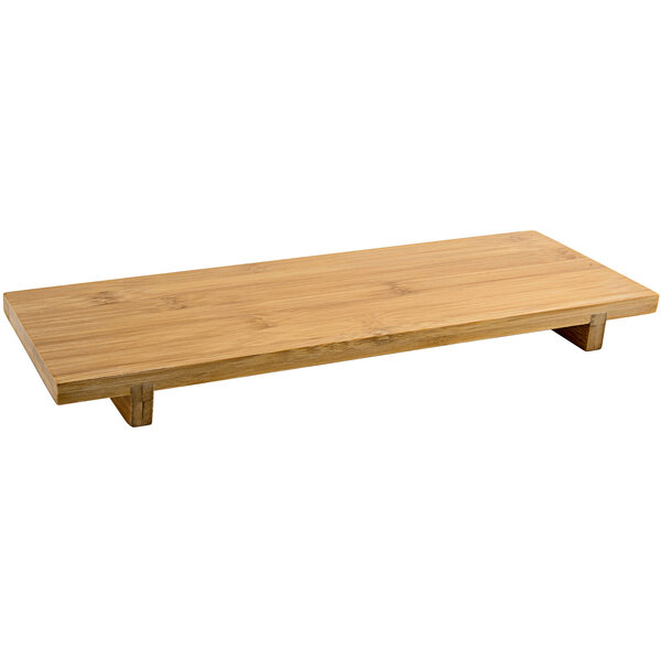 A natural bamboo rectangular footed serving tray.