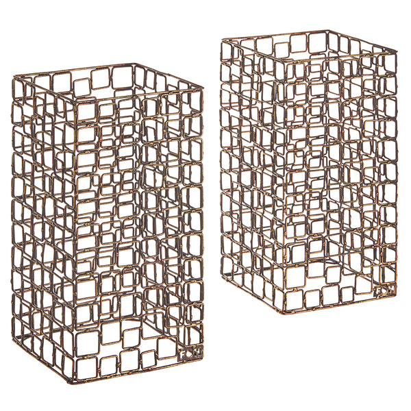 Two copper rectangular display risers with a link design.