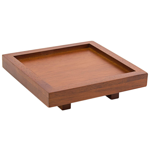 A Room360 Rubberwood square footed serving tray with a square edge on a wooden table.