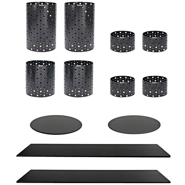 A black circular stainless steel riser set with white dots on black bamboo boards.