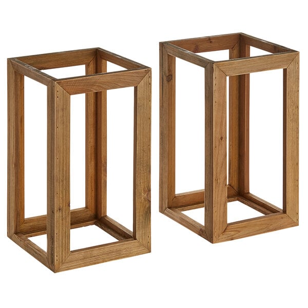 A pair of wooden rectangular risers.