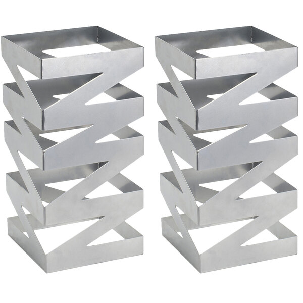 Two silver metal Front of the House risers with a zigzag design.