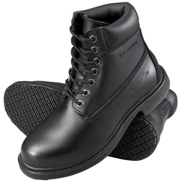 A pair of Genuine Grip black leather boots with a non-slip sole.