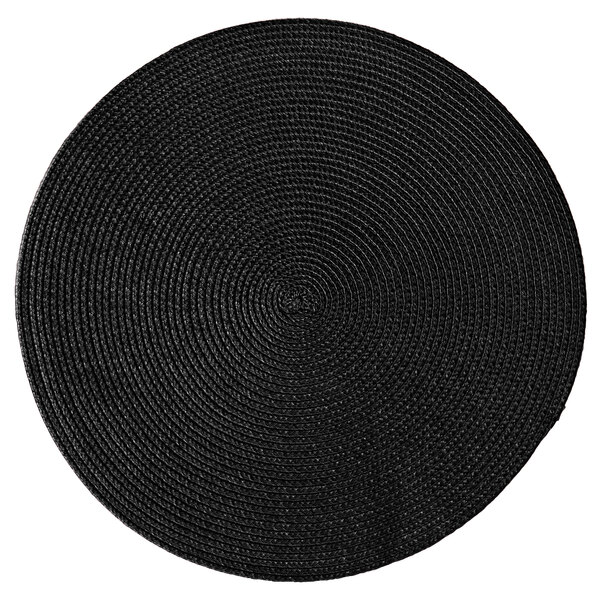 A close-up of a black woven RITZ round placemat.