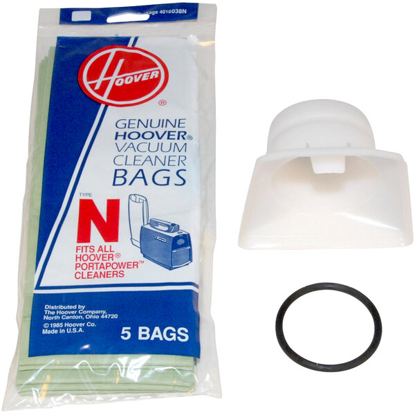 A white bag of vacuum cleaner parts with a white cap.