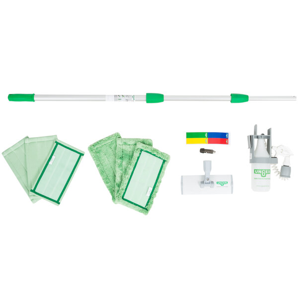 A Unger indoor window cleaning kit with green and white cleaning tools and supplies.