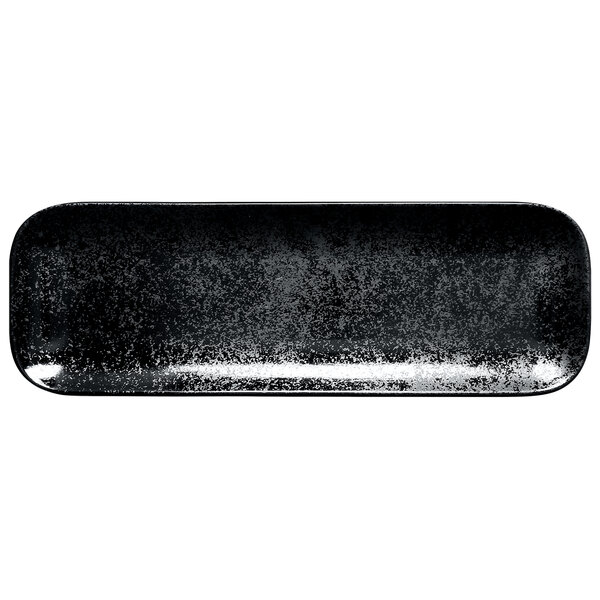 A black rectangular porcelain plate with a white speckled design on the rim.
