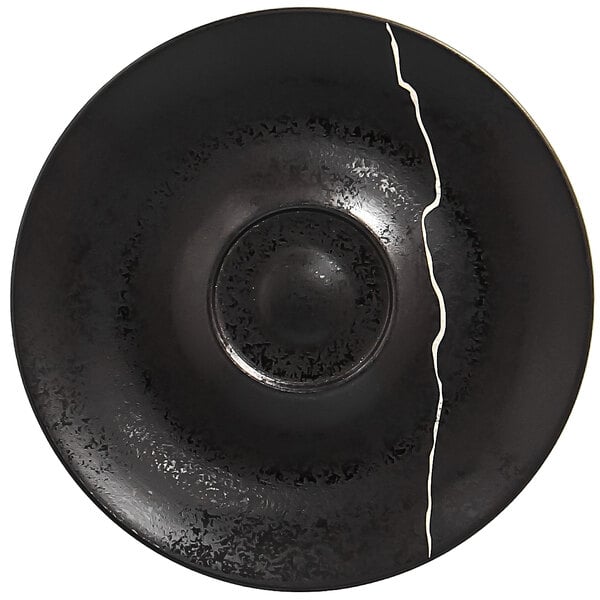 A black RAK Porcelain saucer with silver detail.