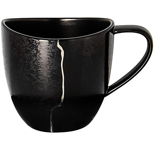 A black porcelain coffee cup with silver detail.