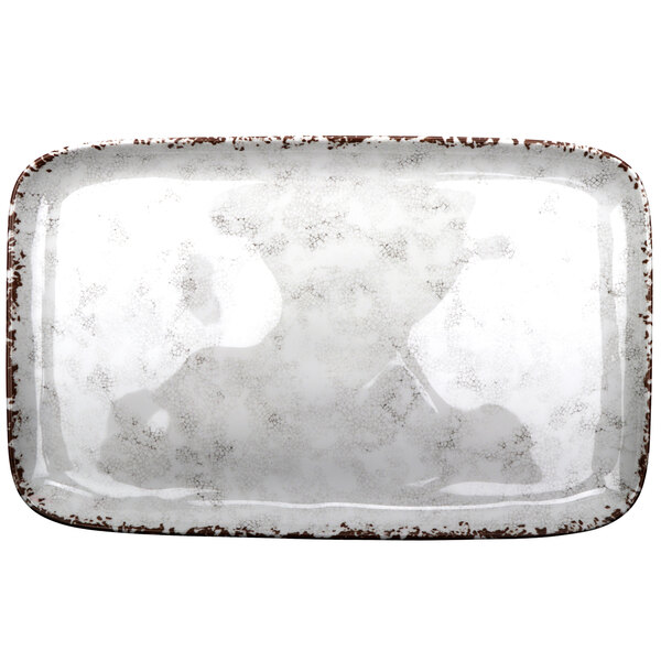 A white rectangular melamine tray with brown speckled edges.