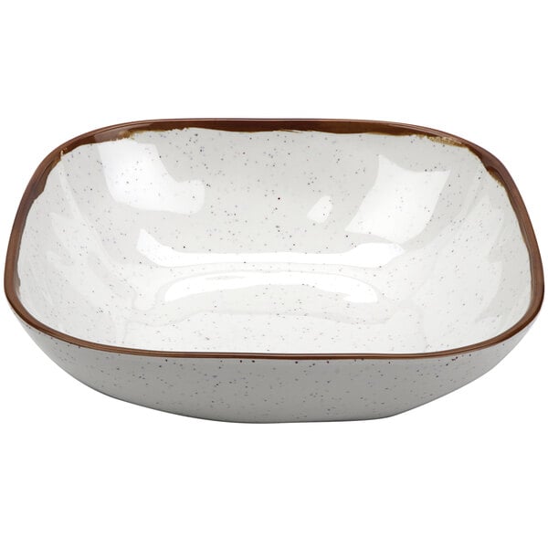 A white and brown square melamine bowl.