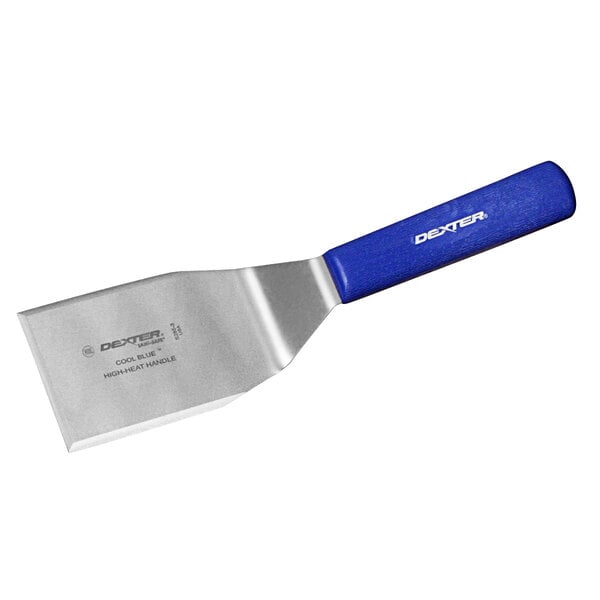 A Dexter-Russell Sani-Safe blue and silver hamburger turner with a beveled edge and a blue handle.