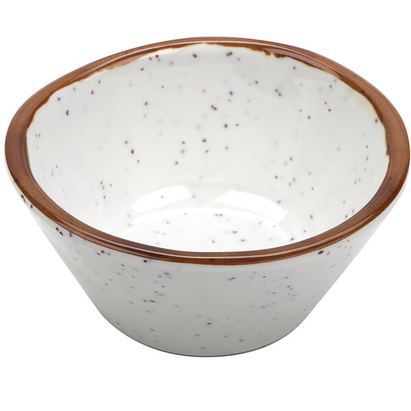 A white and brown speckled bowl.