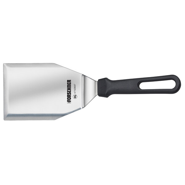 A Victorinox stainless steel hamburger turner with a black handle.