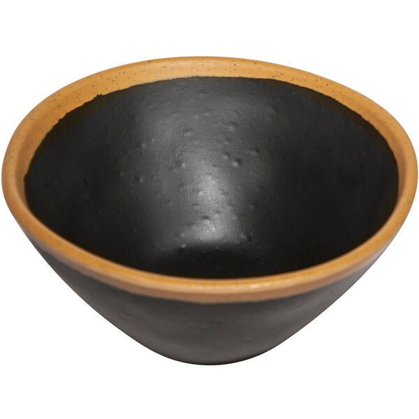 A brown melamine bowl with a clay trim.