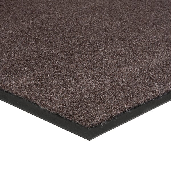 A brown Lavex carpet mat with black rubber edges.