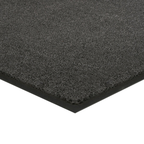 A gray Lavex Olefin entrance mat with a black border.