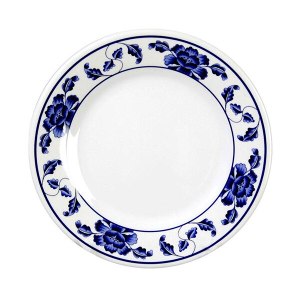 A white Thunder Group melamine plate with blue flowers on it.