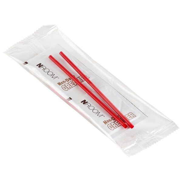 A double serving hot beverage condiment kit with clear packaging containing two red chopsticks in a plastic bag.